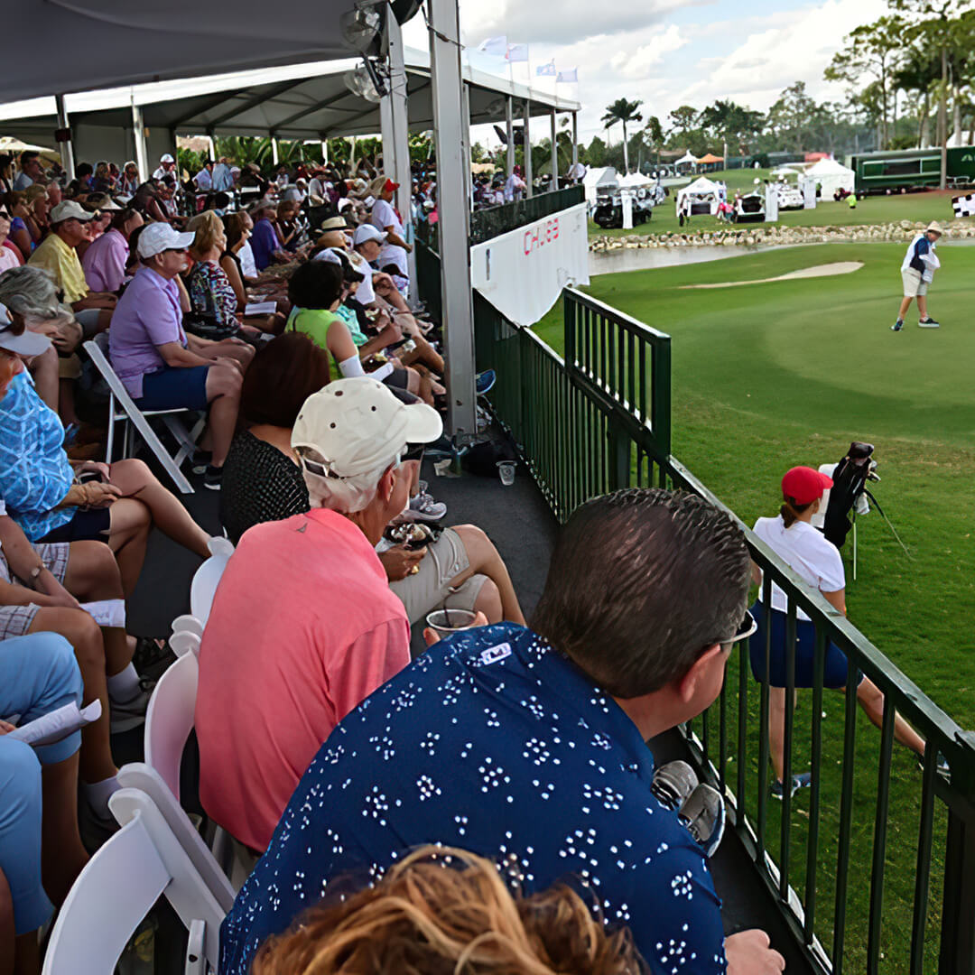 Spectators Watching Golf Tournament from Hospitality Tent